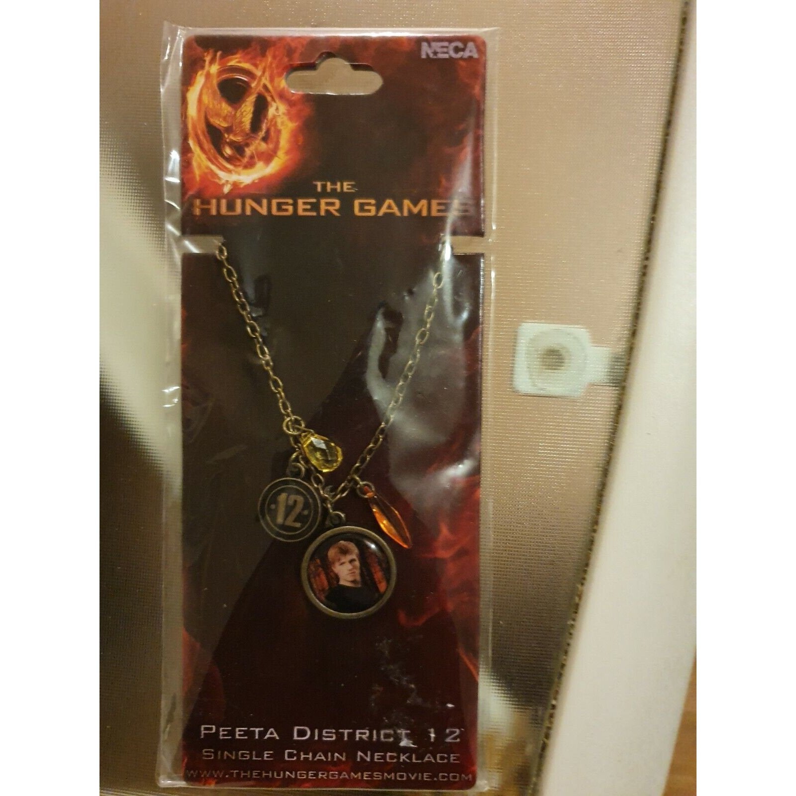 Collier Peeta District 12 The Hunger Games produit derivé